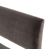 Close up of fabric on Four hands furniture brand washed velvet dining bench with grey fabric seat and dark wood legs on a white background