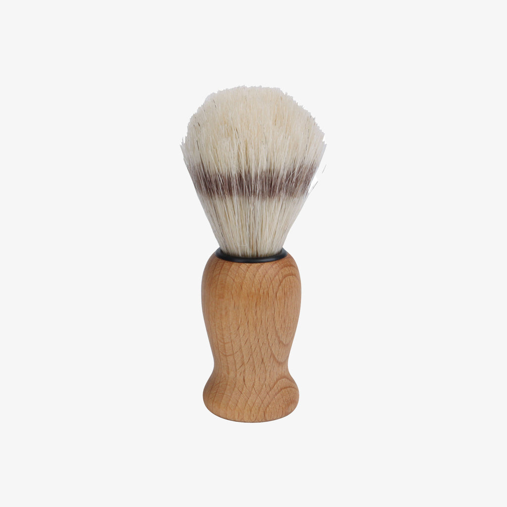 Beechwood shaving brush with natural bristles on a white background