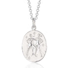Scream Pretty brand silver Gemini zodiac star sign necklaces on a white background