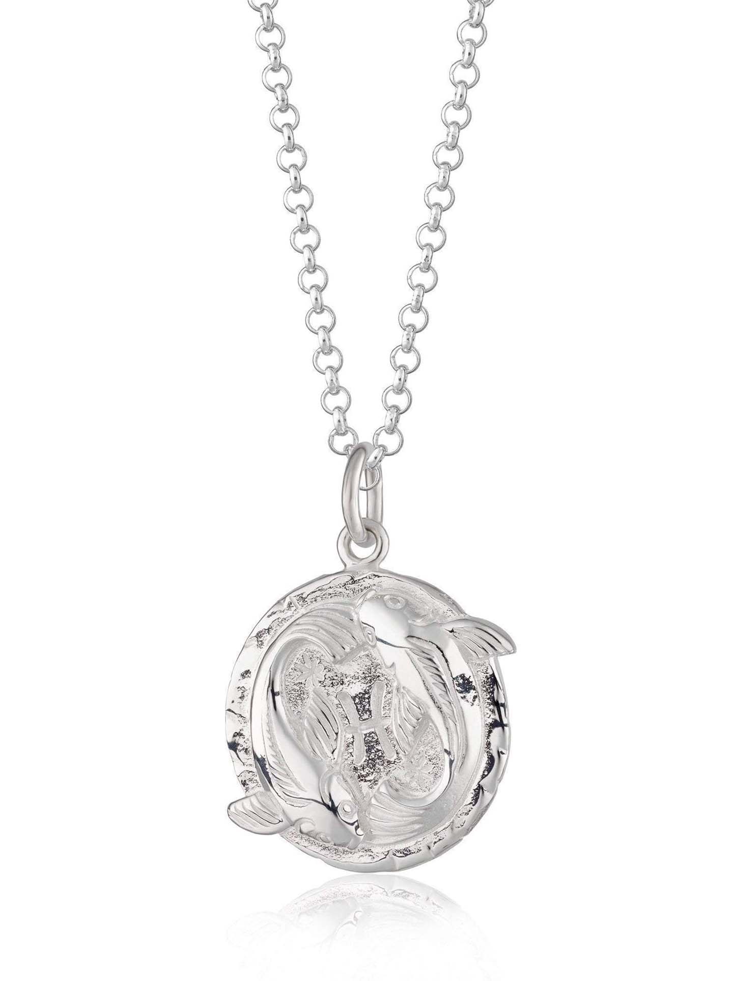 Scream Pretty brand silver Pisces zodiac star sign necklaces on a white background