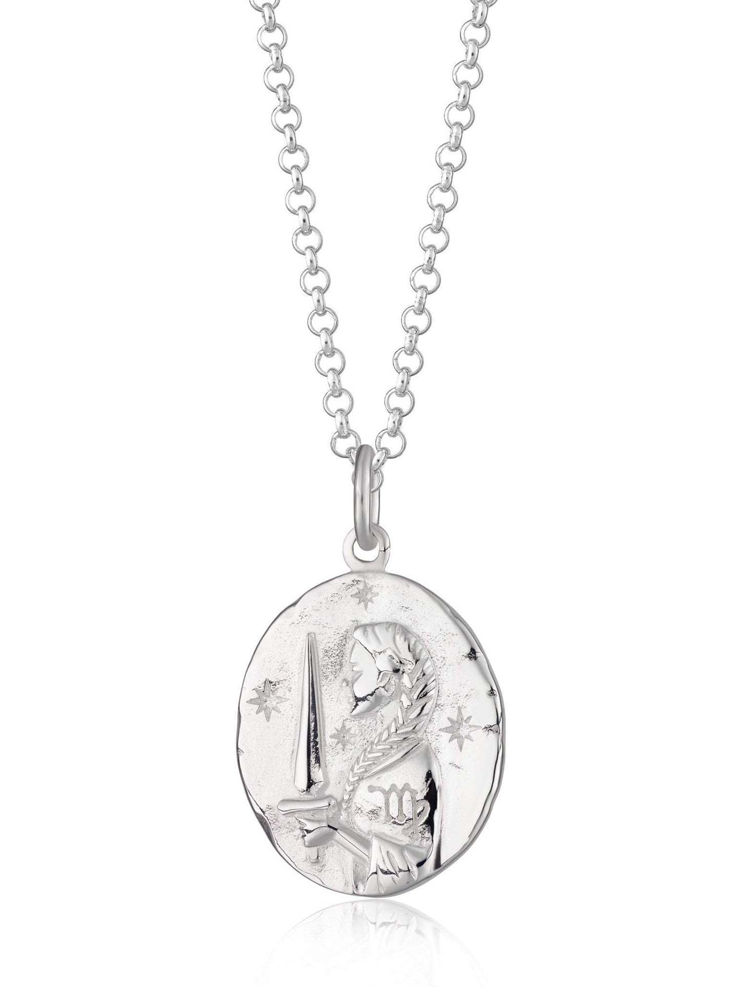 Scream Pretty brand silver Virgo zodiac star sign necklaces on a white background