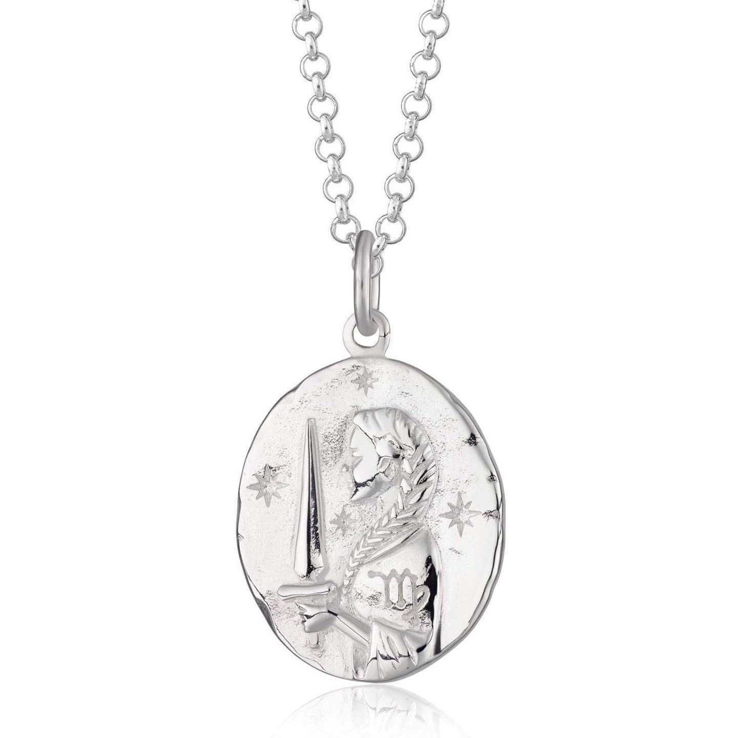 Scream Pretty brand silver Virgo zodiac star sign necklaces on a white background