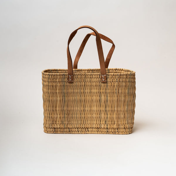 Small rectangular straw bag with leather handle