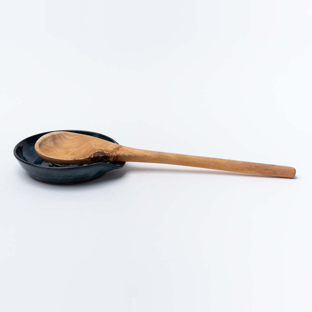 Indigo Handmade stoneware spoon rest on a white background