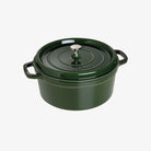 Staub 7 Quart Round Cocotte in Basil Green on a white background