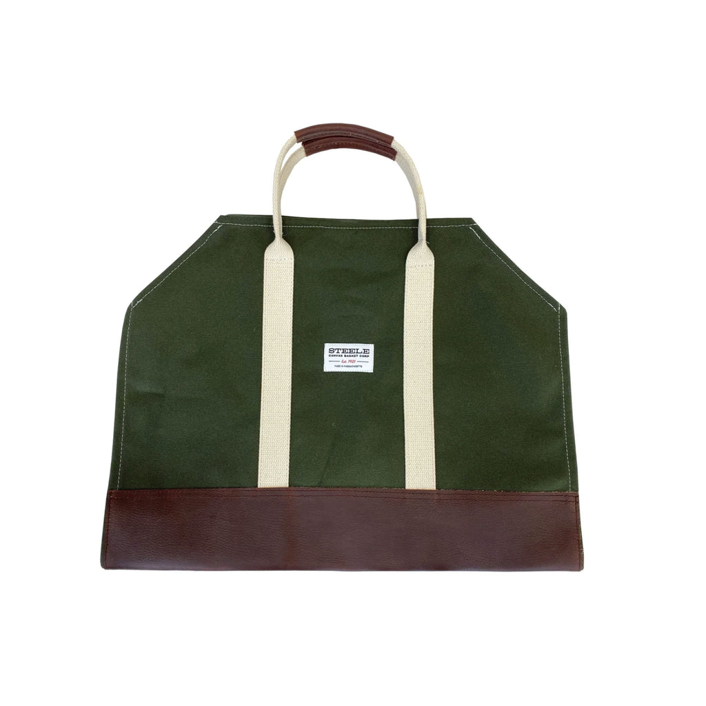 Green Canvas wood carrier with leather bottom on a white background