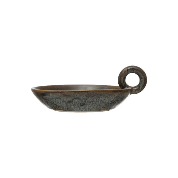 Black stoneware dish with reactive glaze and round finger handle 