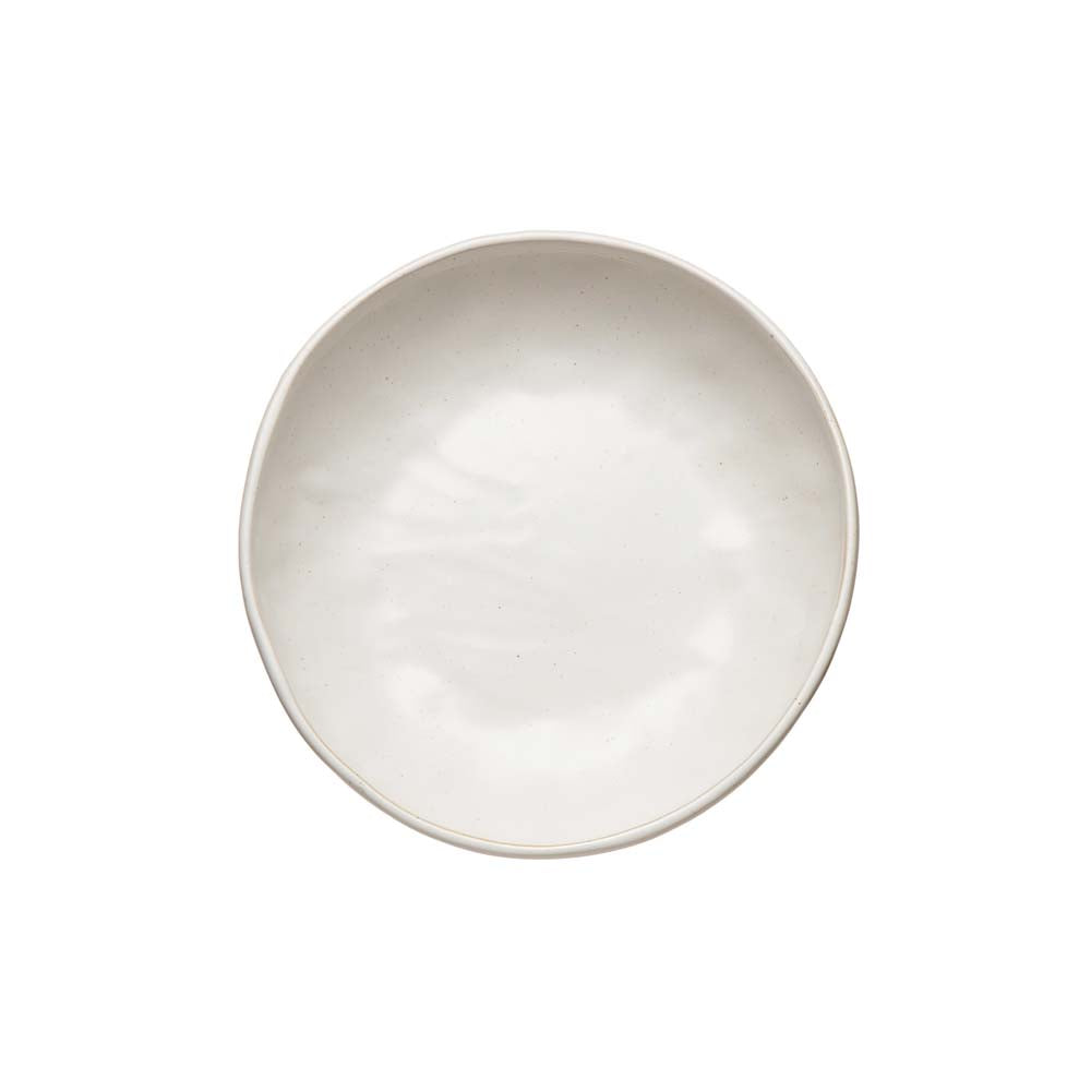 View of top of white glazed pedestal bowl with loop handles on a white background