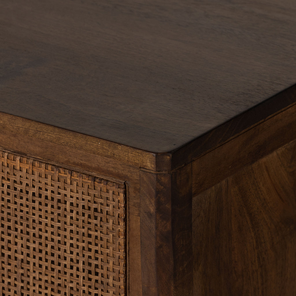 Six drawer 'Sydney' dresser with brown cane stained drawers stained mango wood exterior by Four Hands Furniture on a white background