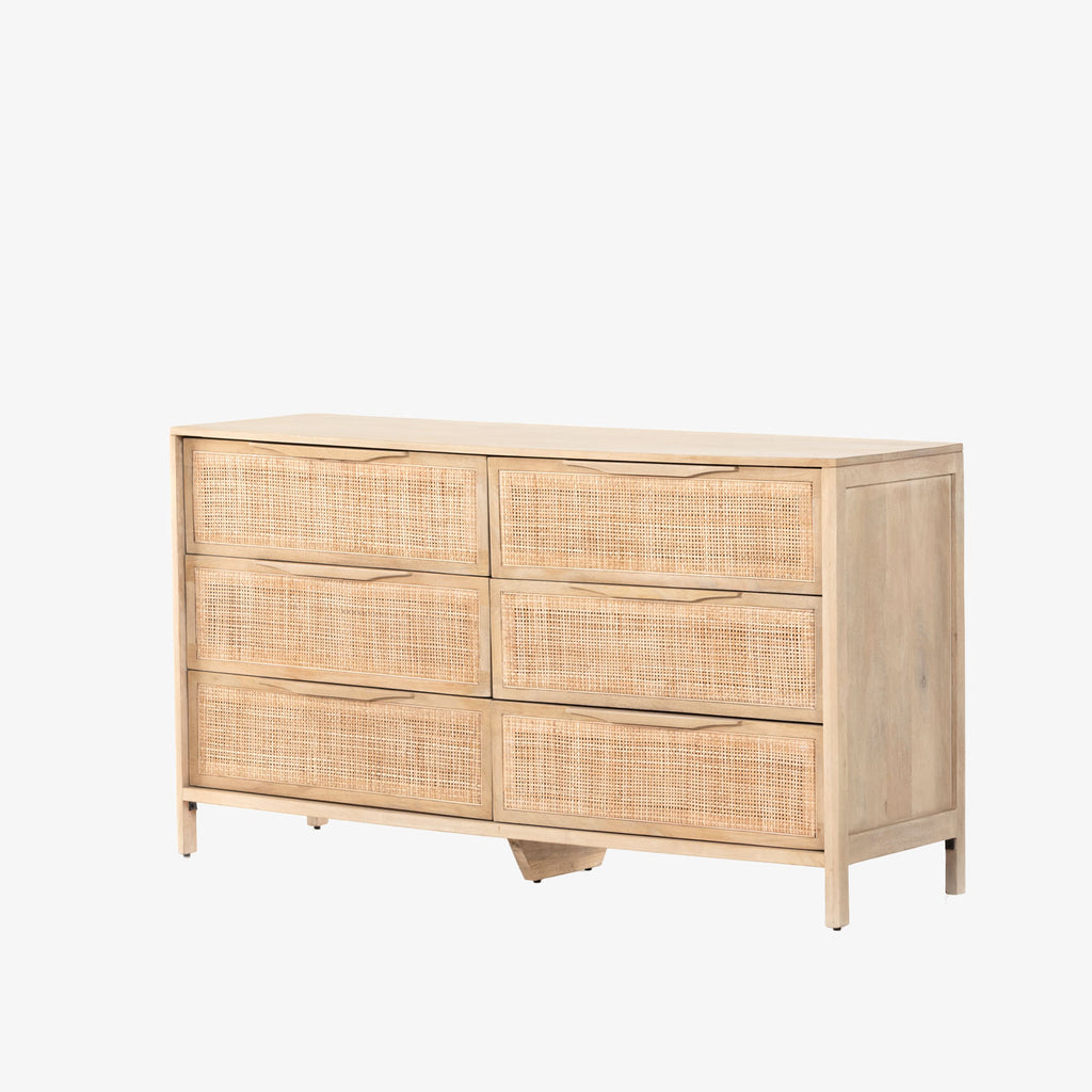 Six drawer 'Sydney' dresser with cane drawer fronts and mango wood pulls with natural mango wood exterior by Four Hands Furniture on a white background