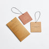 PF Candle Teakwood and Tobacco Car Fragrance hanging tags on a white background