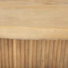 Close up of reeded wood and top of coffee table