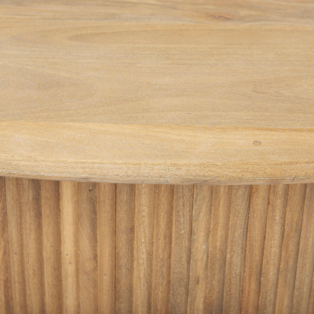 Close up of reeded wood and top of coffee table