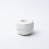 Set of four White marble nesting bowls on a white background