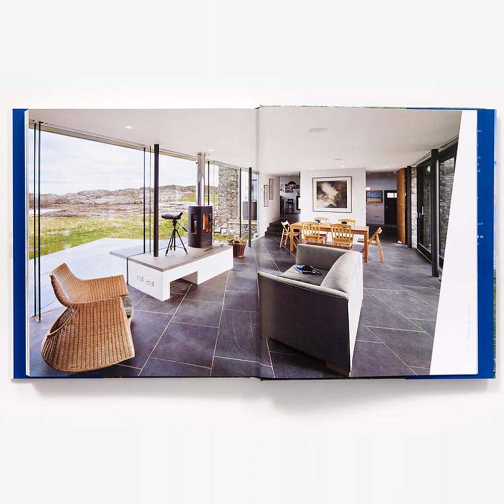 Interior pages of book: The New Old House historic and modern architecture combined showing a glass walled living room