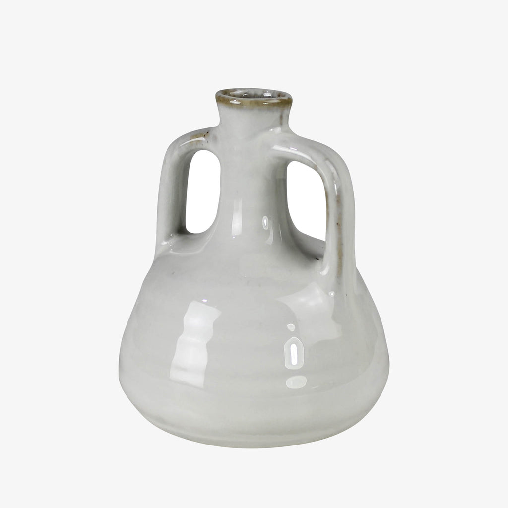 White ceramic vase with curved handles on a white background