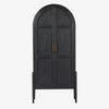 Four hands furniture brand Tolle black cabinet with arched top and black wood stained interior on a white background