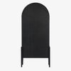 Four hands furniture brand Tolle panel door black cabinet with arched top and wood stained interior on a white background 