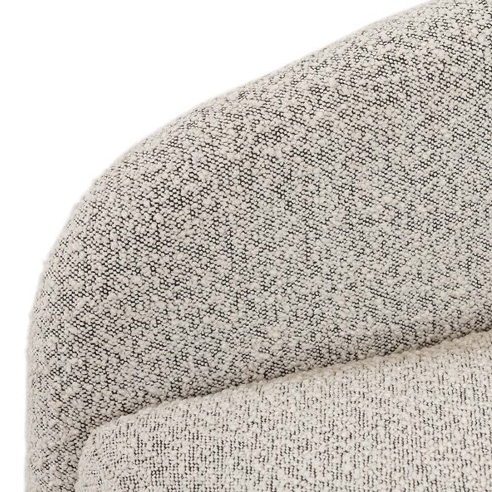 Four hands brand Topanga swivel chair with boucle grey and creme fabric on a white background