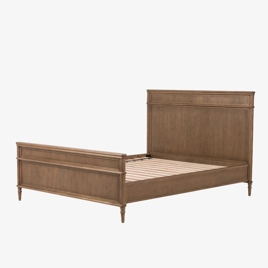 Wood 'Toulouse' bed with panels and spindle legs by Four hands furniture on a white background