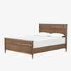 Wood 'Toulouse' bed with panels and spindle legs by Four hands furniture on a white background