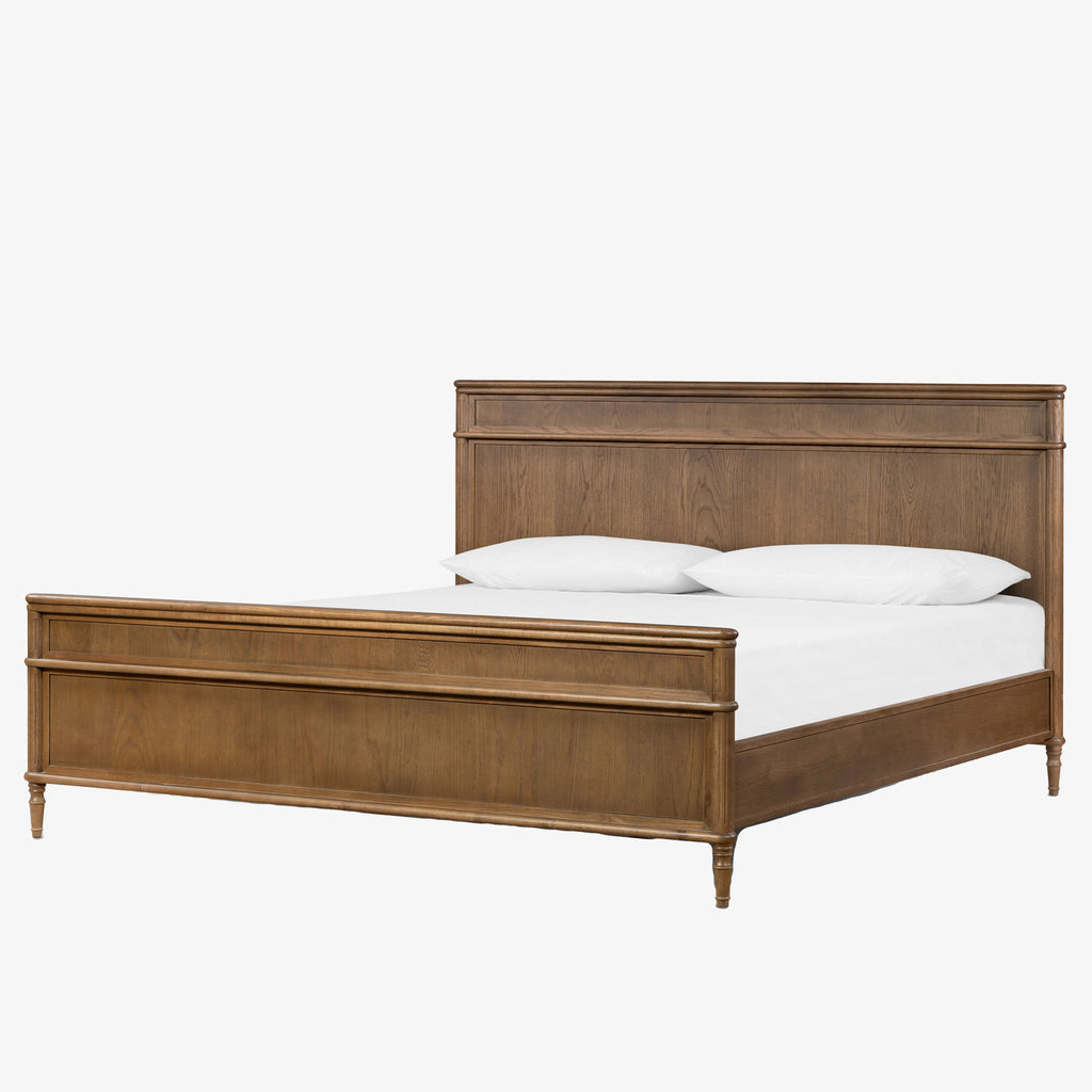 Wood 'Toulouse' bed with panels and spindle legs by Four hands furniture on a white background