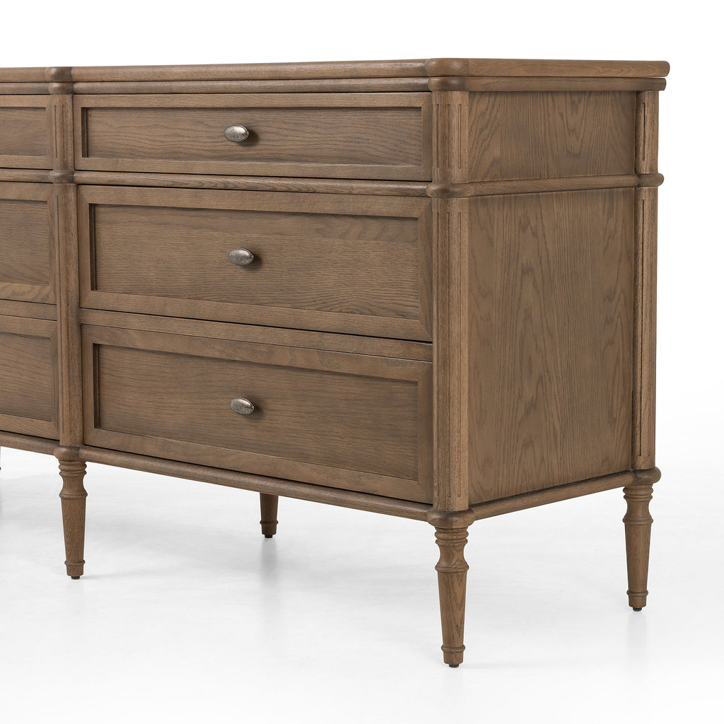 Oak six drawer 'Toulouse' dresser by four hands furniture on a white background