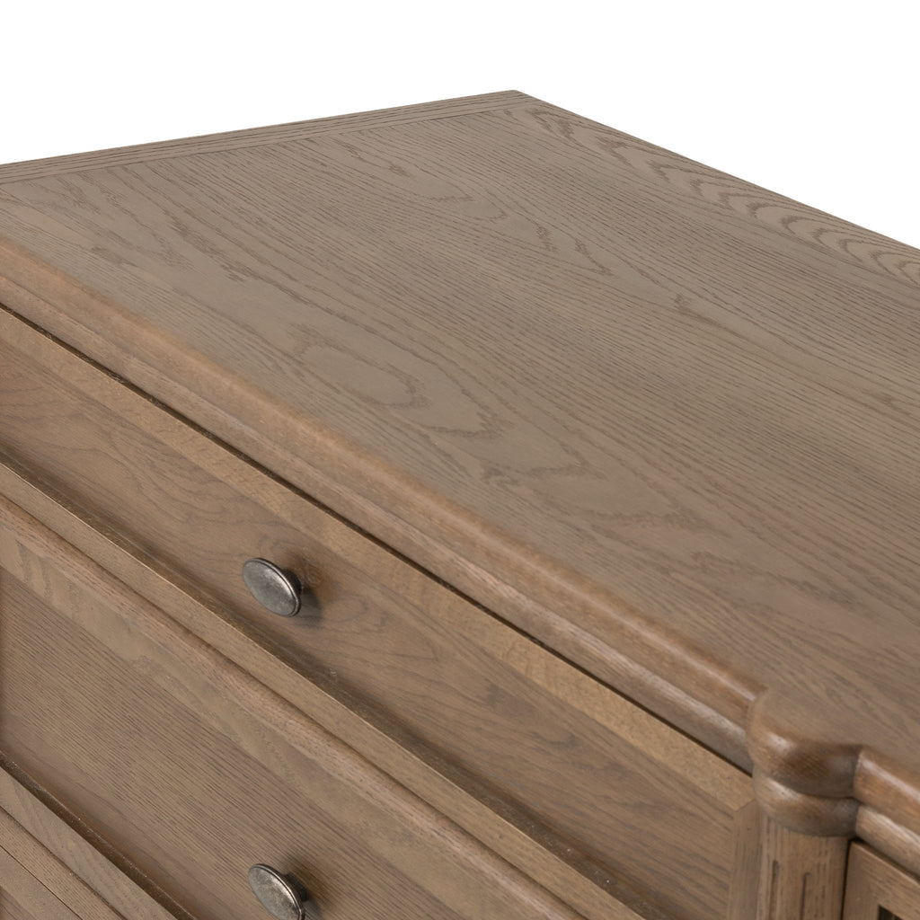 Oak six drawer 'Toulouse' dresser by four hands furniture on a white background