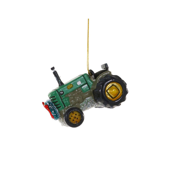 Tractor Christmas ornament by Cody Foster on a white background