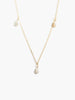 Able brand triple pearl gold necklace on a white background