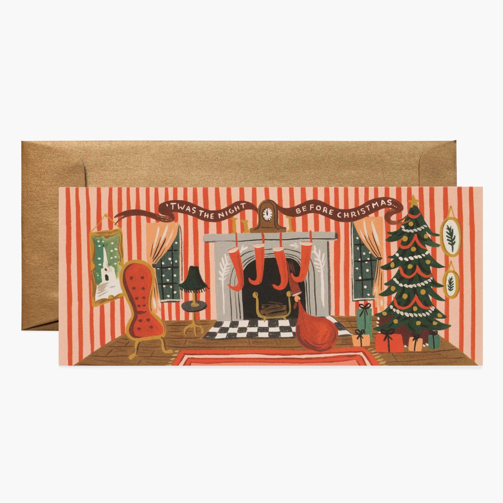 Rifle Paper 'Twas the Night Greeting Card' with illustration of living room with striped walls and christmad tree and stockings hung on fireplace