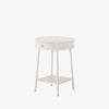 White round 'van' side table with shelf and drawer  by four hands furniture on a white background