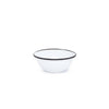 White enamel cereal bowl with black rim on white background.