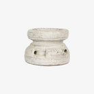 Vintage white seed spreader on a white background
