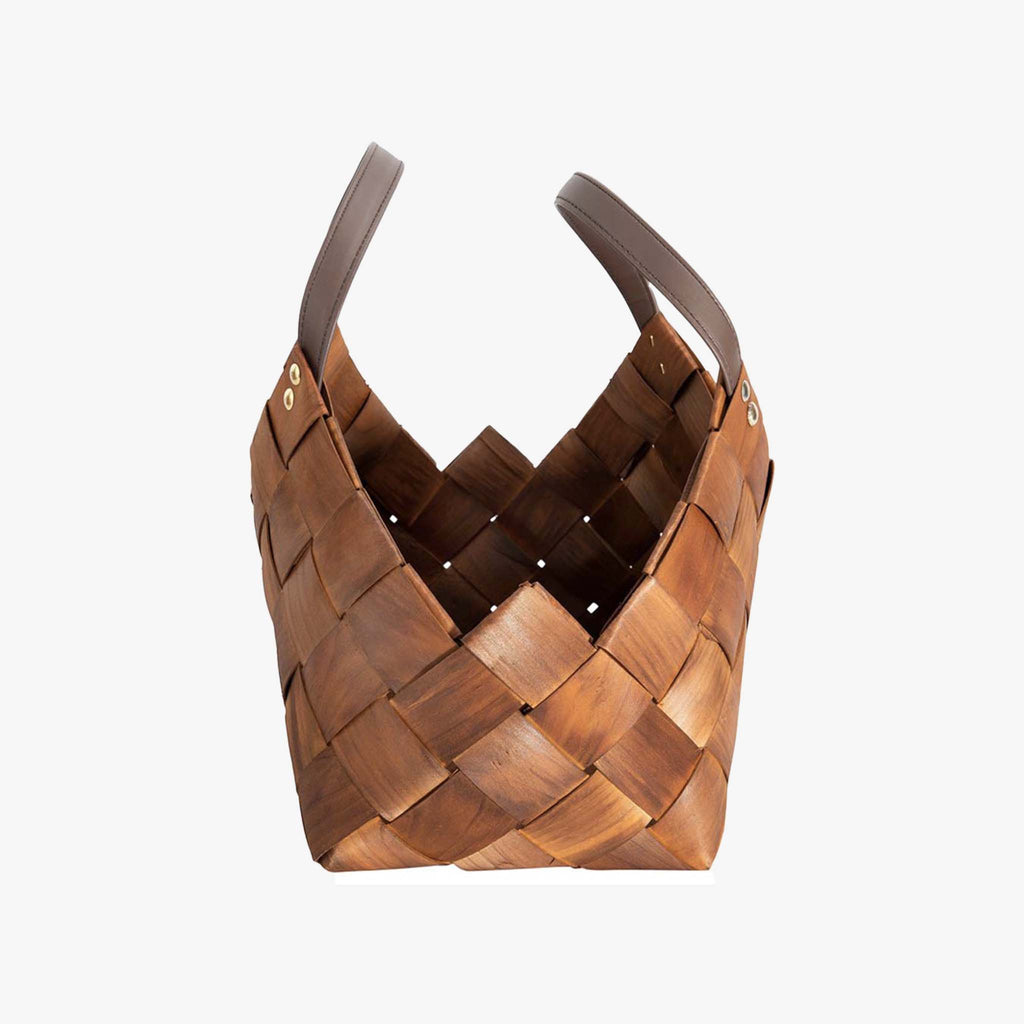 Side view of brown rectangular woven baskets with leather handle