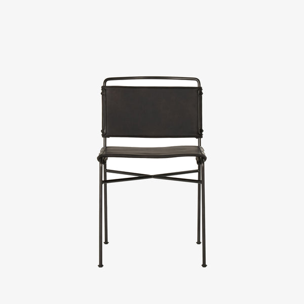 Four hands brand wharton chair with black iron frame and black leather seat on a white background