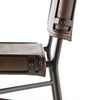 Close up view of Four hands brand wharton counter stool with black iron frame and dark brown leather seat on a white background