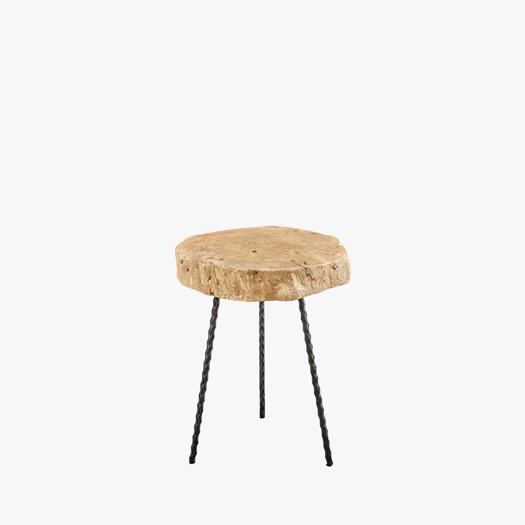 Reclaimed pine top table with three metal legs on a white background