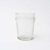 Hand blown juice glass on a white background
