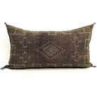 Large brown hand embroidered moroccan silk throw pillow on a white background
