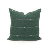 Square green throw pillow on a white background